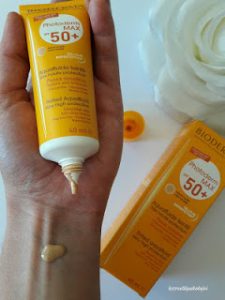 باز شده ی کرم ضد آفتاب رنگ روشن فتودرم مکس آکوا فلوئید بایودرما SPF50+